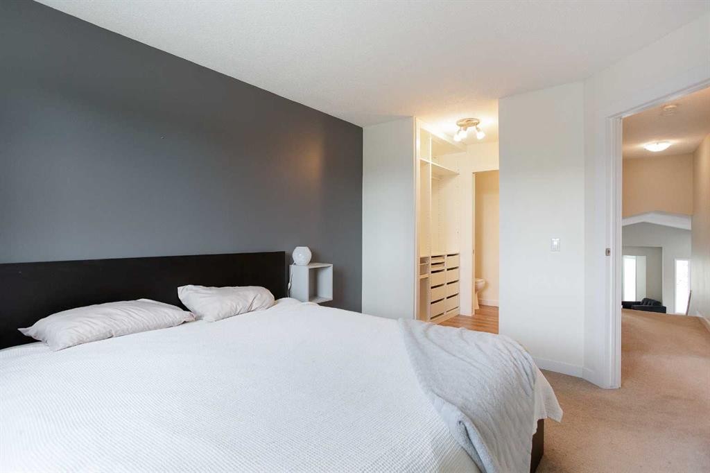 2420 Riverstone Road Se, Calgary, AB - Indoor Photo Showing Bedroom