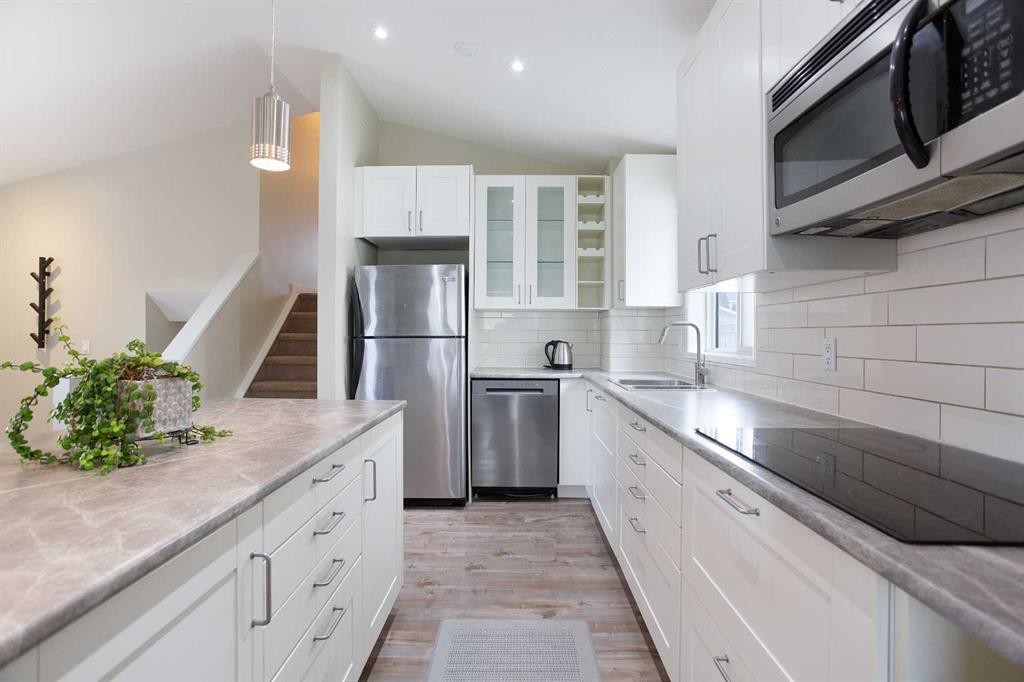 2420 Riverstone Road Se, Calgary, AB - Indoor Photo Showing Kitchen With Stainless Steel Kitchen With Upgraded Kitchen