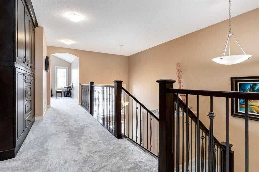7 Sunset Way, Cochrane, AB - Indoor Photo Showing Other Room