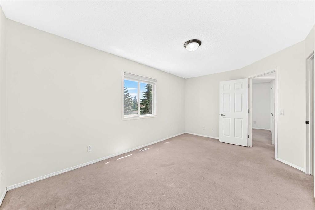 6 Cougarstone Crescent Sw, Calgary, AB - Indoor Photo Showing Other Room