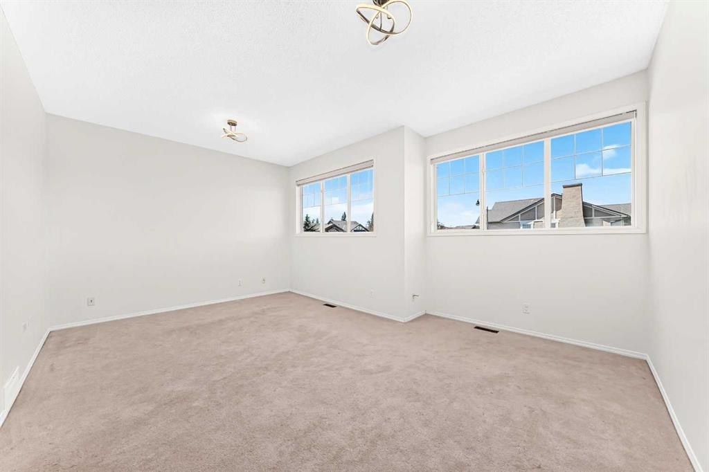 6 Cougarstone Crescent Sw, Calgary, AB - Indoor Photo Showing Other Room