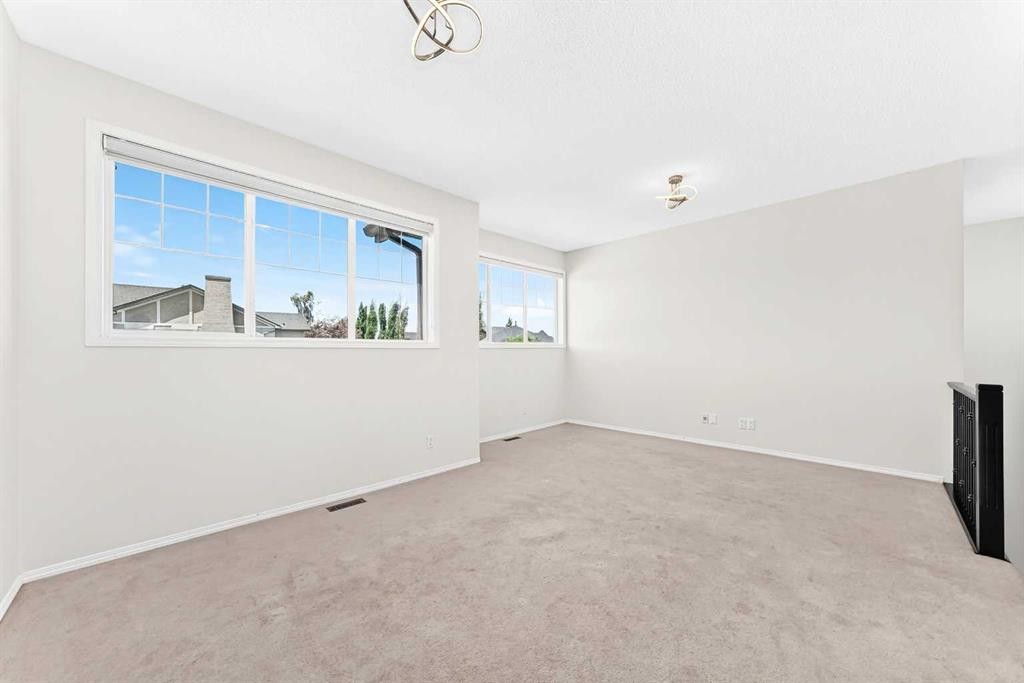 6 Cougarstone Crescent Sw, Calgary, AB - Indoor Photo Showing Other Room