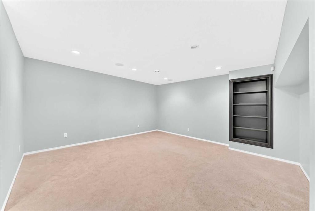 6 Cougarstone Crescent Sw, Calgary, AB - Indoor Photo Showing Other Room