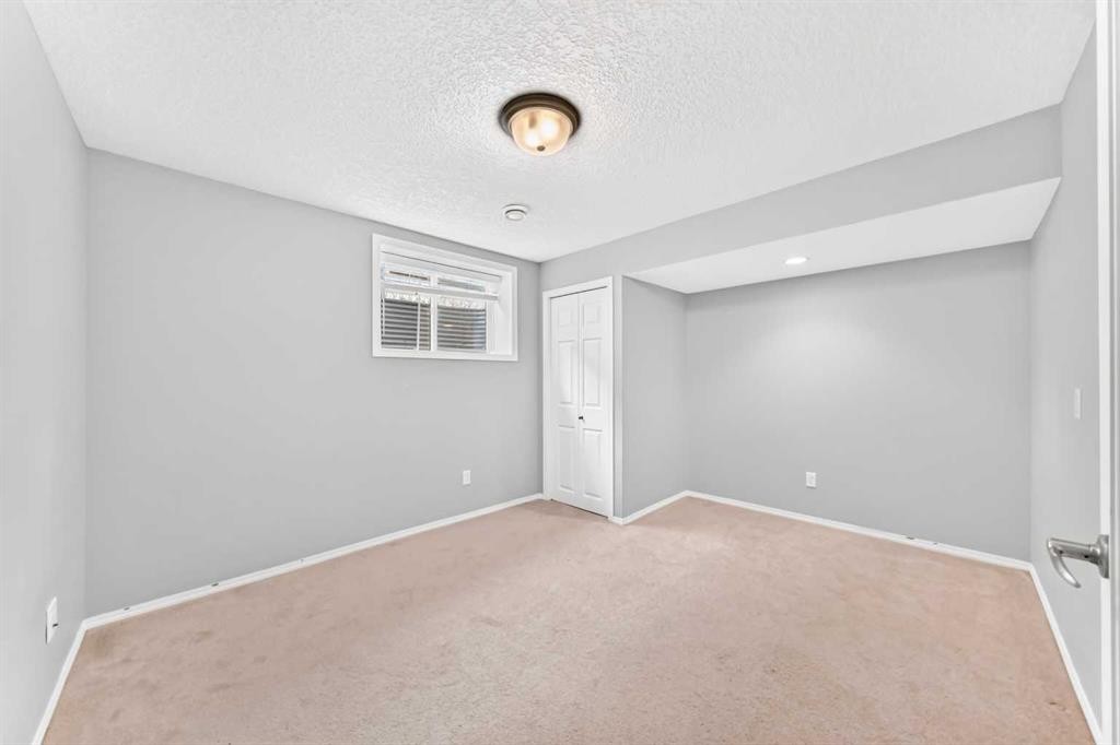 6 Cougarstone Crescent Sw, Calgary, AB - Indoor Photo Showing Other Room
