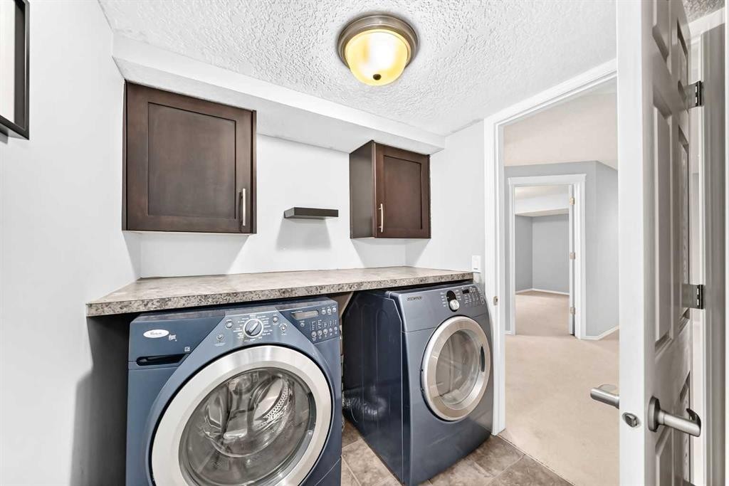 6 Cougarstone Crescent Sw, Calgary, AB - Indoor Photo Showing Laundry Room