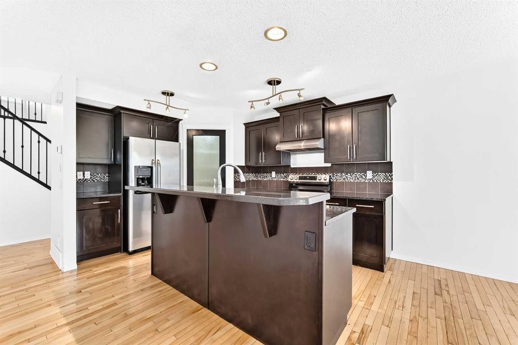 6 Cougarstone Crescent Sw, Calgary, AB - Indoor Photo Showing Kitchen With Upgraded Kitchen