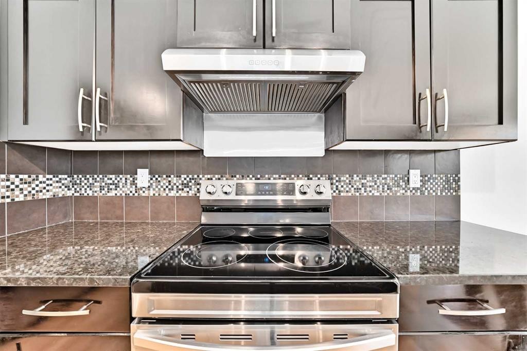 6 Cougarstone Crescent Sw, Calgary, AB - Indoor Photo Showing Kitchen With Upgraded Kitchen