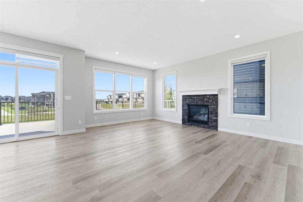 40 Evansfield Manor Nw, Calgary, AB - Indoor Photo Showing Living Room With Fireplace