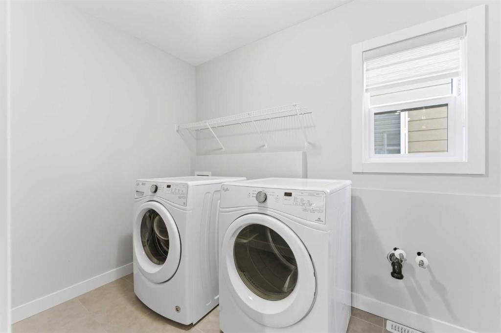 40 Evansfield Manor Nw, Calgary, AB - Indoor Photo Showing Laundry Room