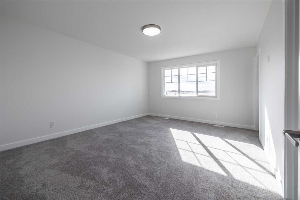 67 Amber View, Balzac, AB - Indoor Photo Showing Other Room