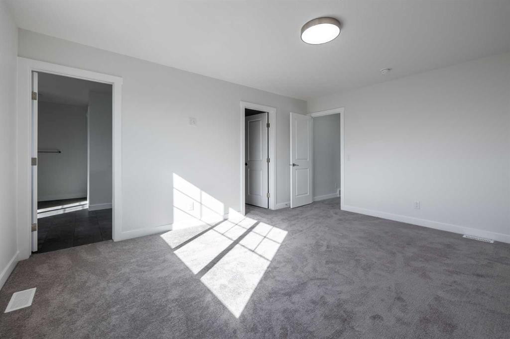 67 Amber View, Balzac, AB - Indoor Photo Showing Other Room