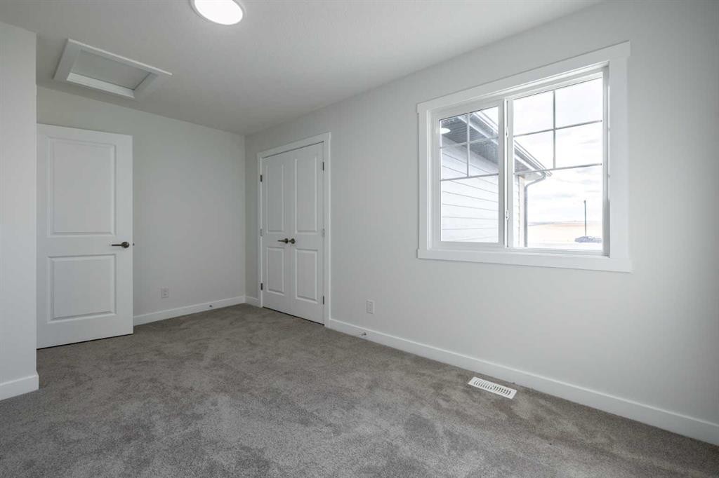 67 Amber View, Balzac, AB - Indoor Photo Showing Other Room