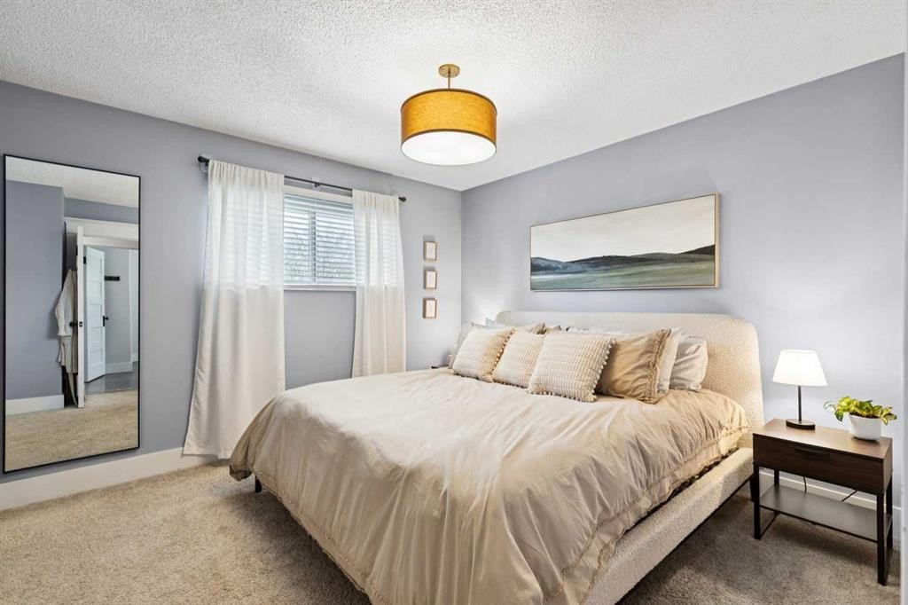 162 Fyffe Road Se, Calgary, AB - Indoor Photo Showing Bedroom