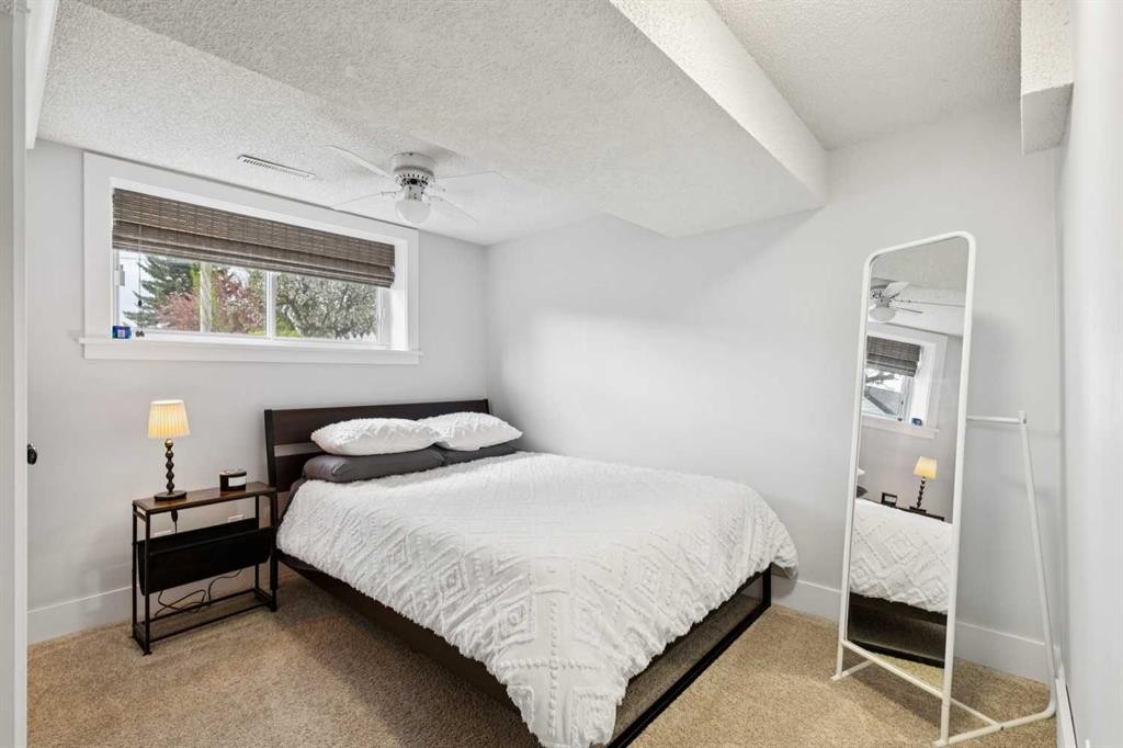 162 Fyffe Road Se, Calgary, AB - Indoor Photo Showing Bedroom