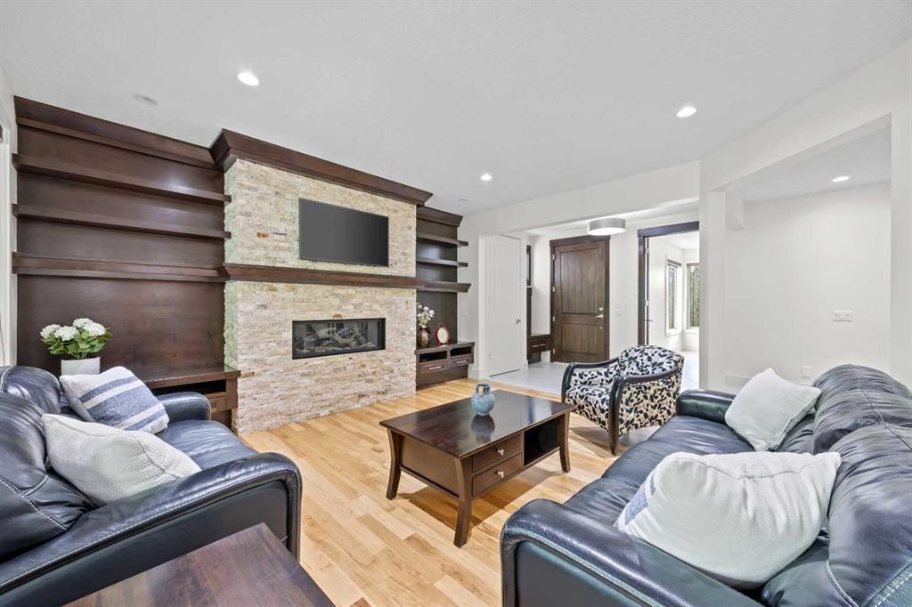 89 Evergreen Mount Sw, Calgary, AB - Indoor Photo Showing Living Room With Fireplace