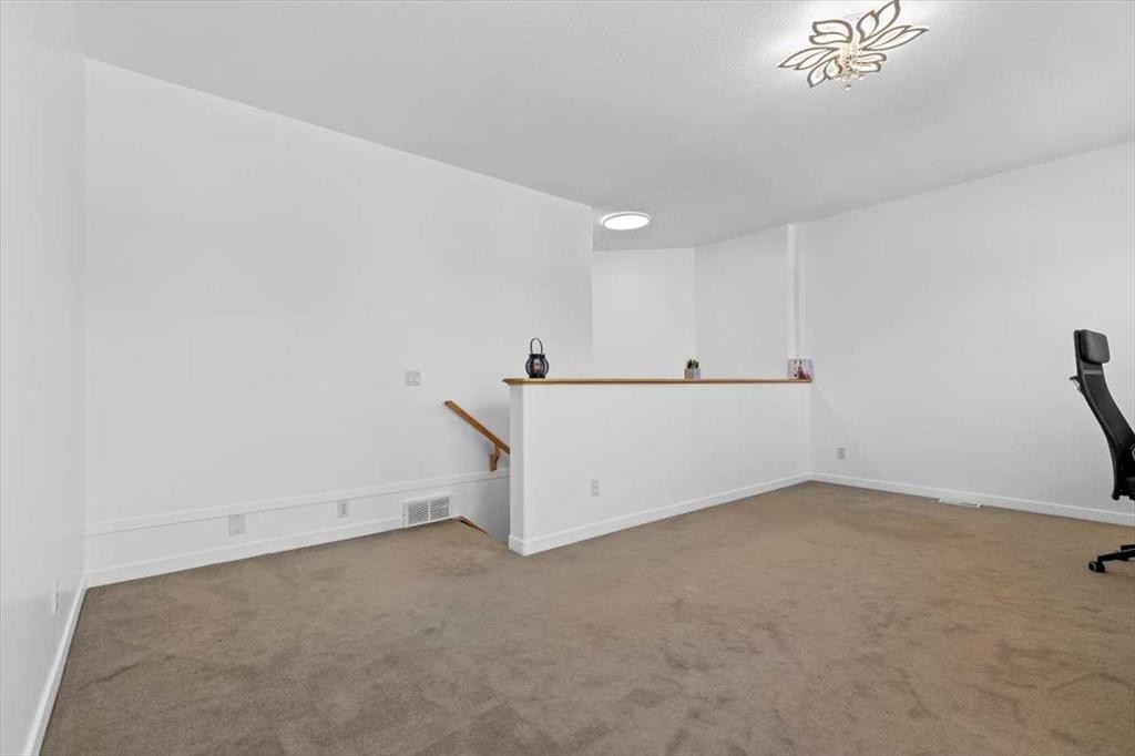 57 Everwillow Boulevard Sw, Calgary, AB - Indoor Photo Showing Other Room