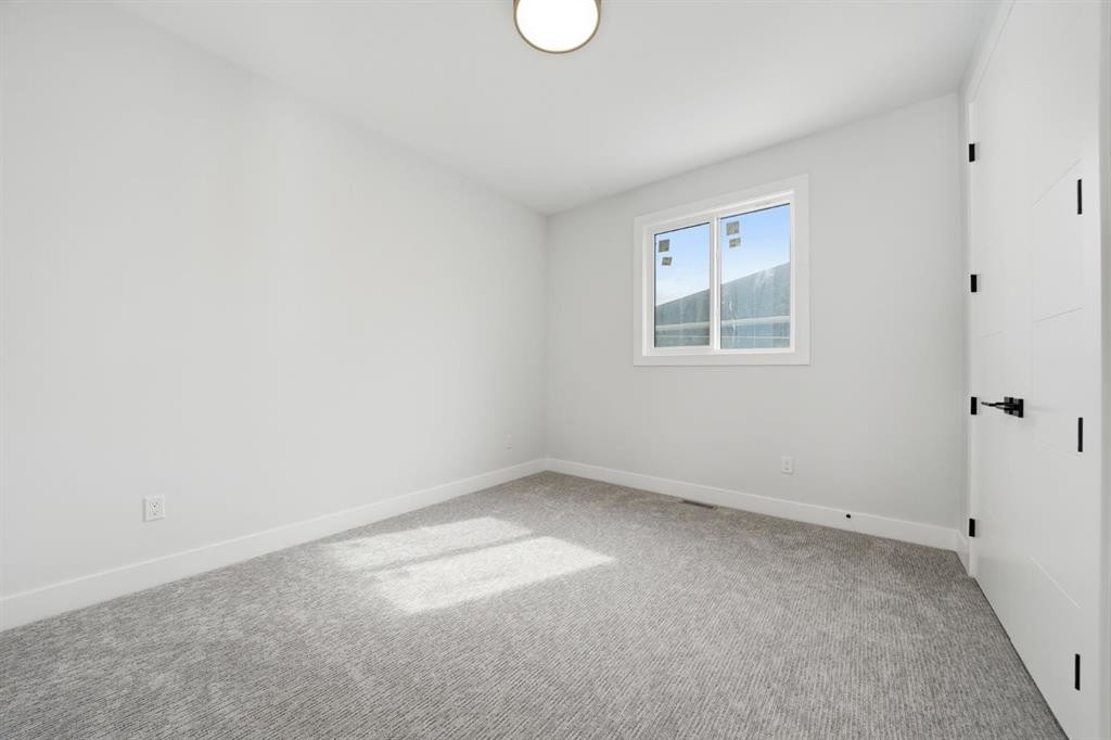 2005 Waterbury Road, Chestermere, AB - Indoor Photo Showing Other Room