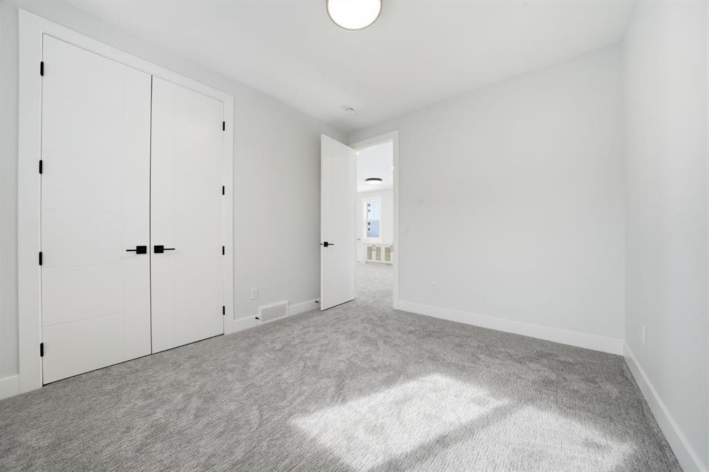 2005 Waterbury Road, Chestermere, AB - Indoor Photo Showing Other Room