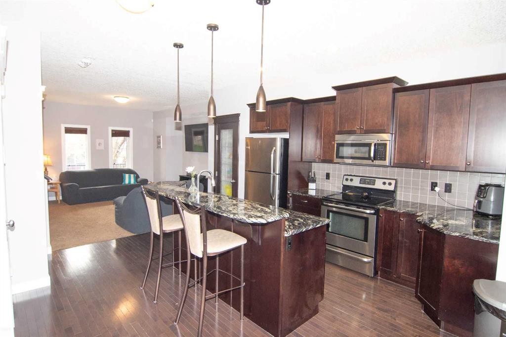 209 Evansdale Landing Nw, Calgary, AB - Indoor Photo Showing Kitchen With Stainless Steel Kitchen With Upgraded Kitchen