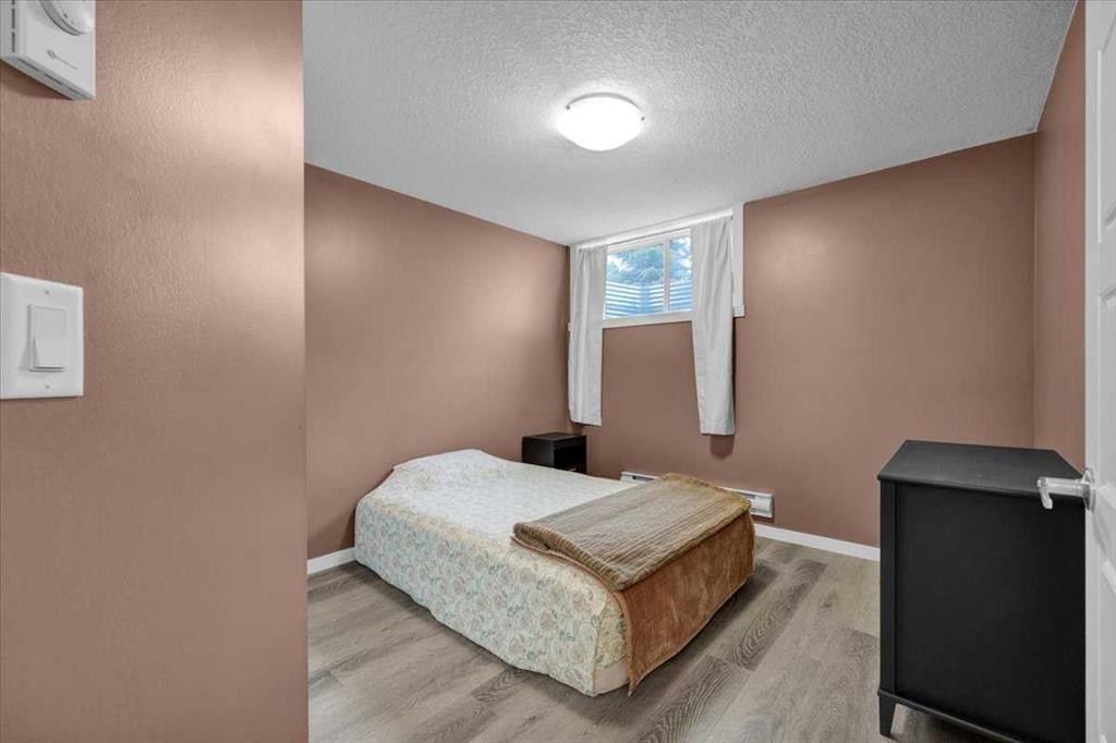 216-474 Seton Circle Se, Calgary, AB - Indoor Photo Showing Bedroom