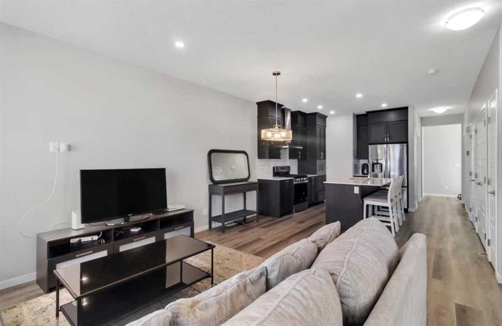 101-Dawson Drive, Chestermere, AB - Indoor Photo Showing Living Room