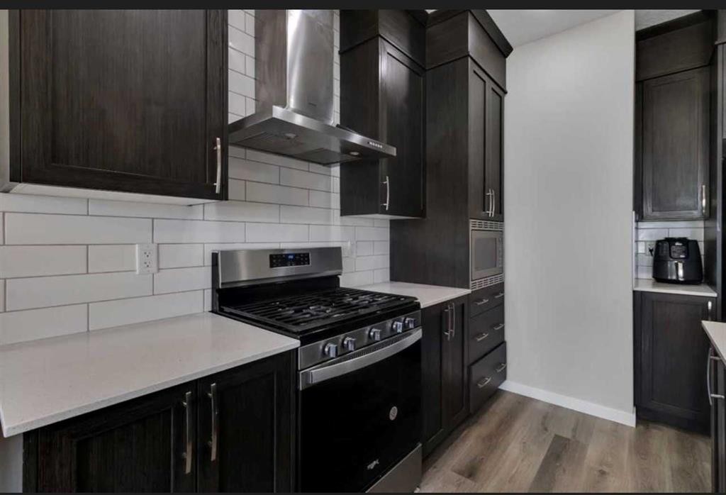 101-Dawson Drive, Chestermere, AB - Indoor Photo Showing Kitchen
