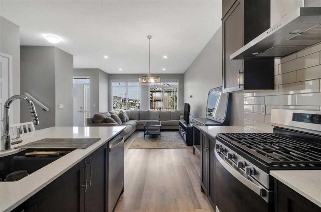 101-Dawson Drive, Chestermere, AB - Indoor Photo Showing Kitchen With Upgraded Kitchen