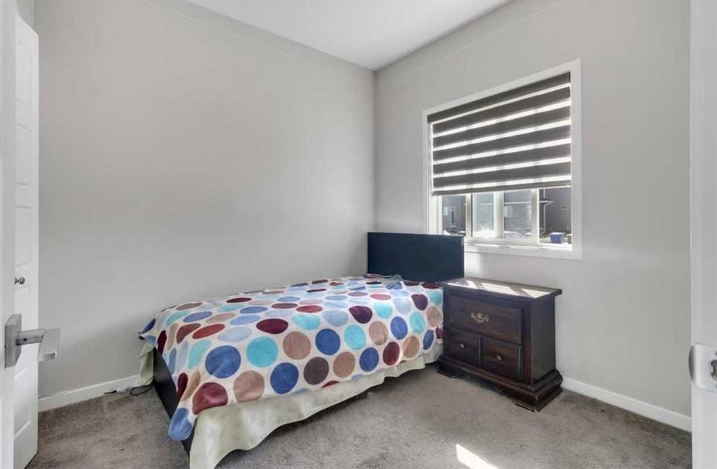 101-Dawson Drive, Chestermere, AB - Indoor Photo Showing Bedroom