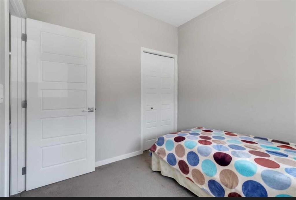 101-Dawson Drive, Chestermere, AB - Indoor Photo Showing Bedroom