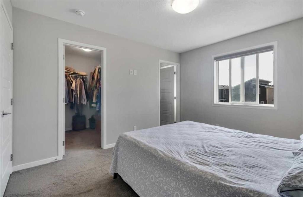101-Dawson Drive, Chestermere, AB - Indoor Photo Showing Bedroom