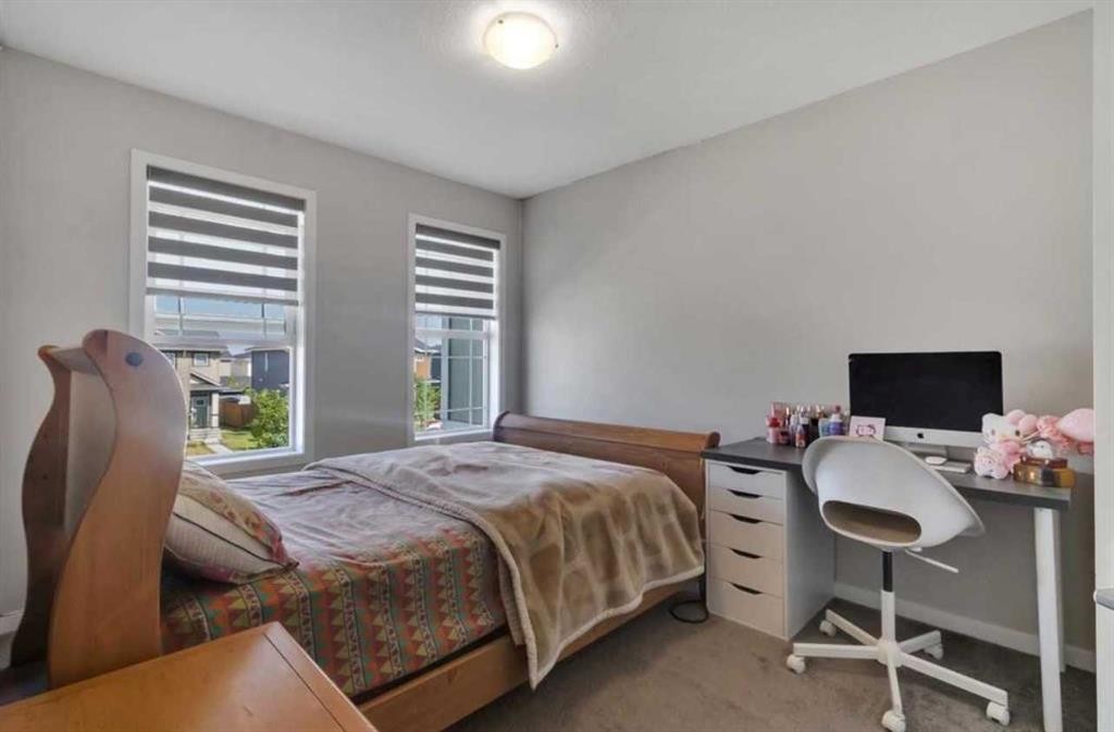 101-Dawson Drive, Chestermere, AB - Indoor Photo Showing Bedroom