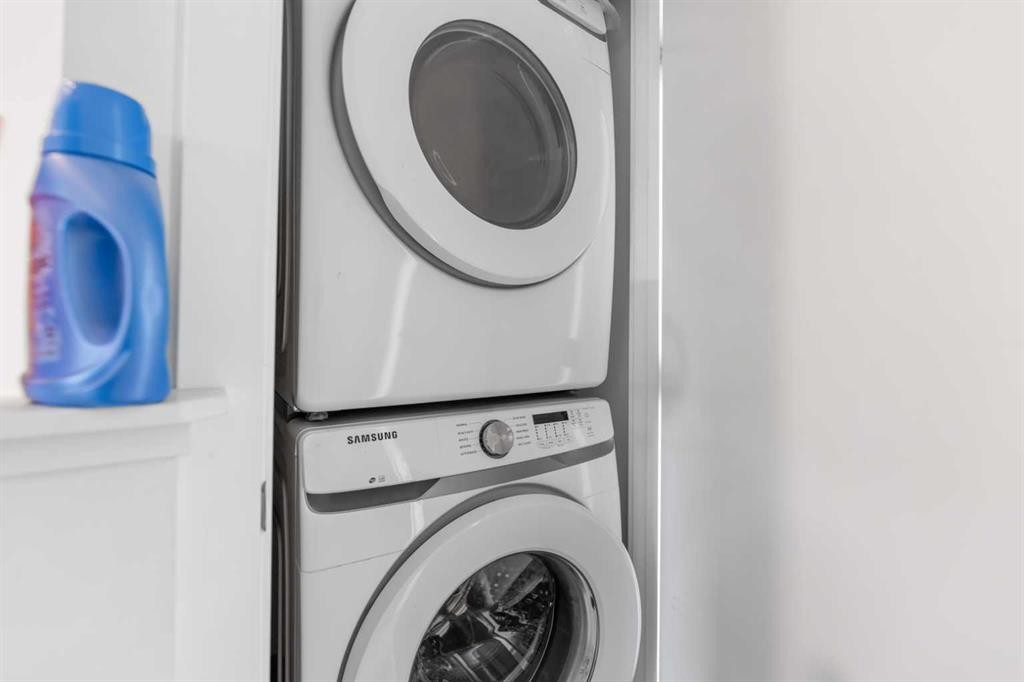 211-101 Panatella Square Nw, Calgary, AB - Indoor Photo Showing Laundry Room