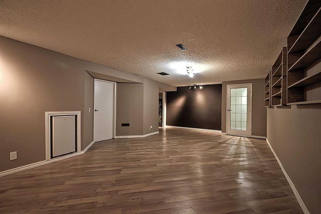 48 Deermont Way Se, Calgary, AB - Indoor Photo Showing Other Room