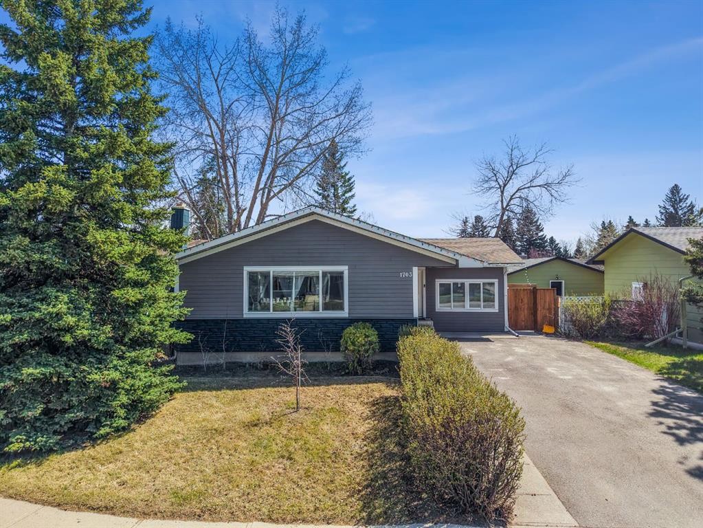 1703 110 Avenue Sw, Calgary, AB - Outdoor With Facade