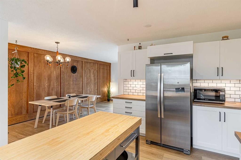 111 Lynnview Way Se, Calgary, AB - Indoor Photo Showing Kitchen With Stainless Steel Kitchen
