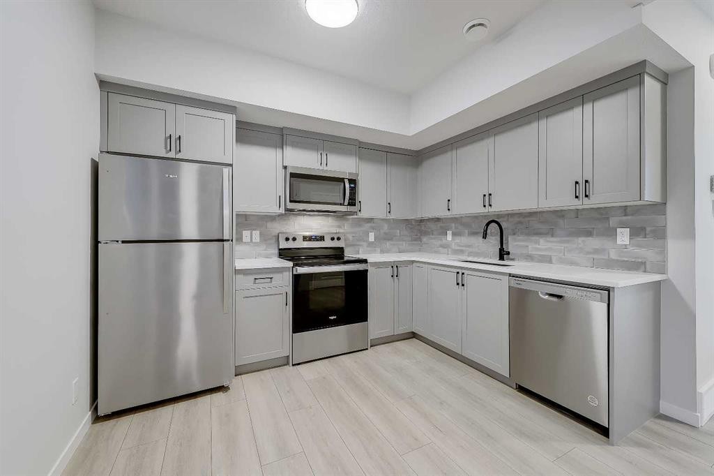 164 Setonstone Manor Se, Calgary, AB - Indoor Photo Showing Kitchen With Stainless Steel Kitchen