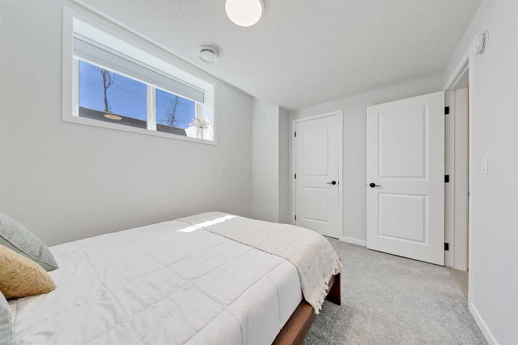 164 Setonstone Manor Se, Calgary, AB - Indoor Photo Showing Bedroom