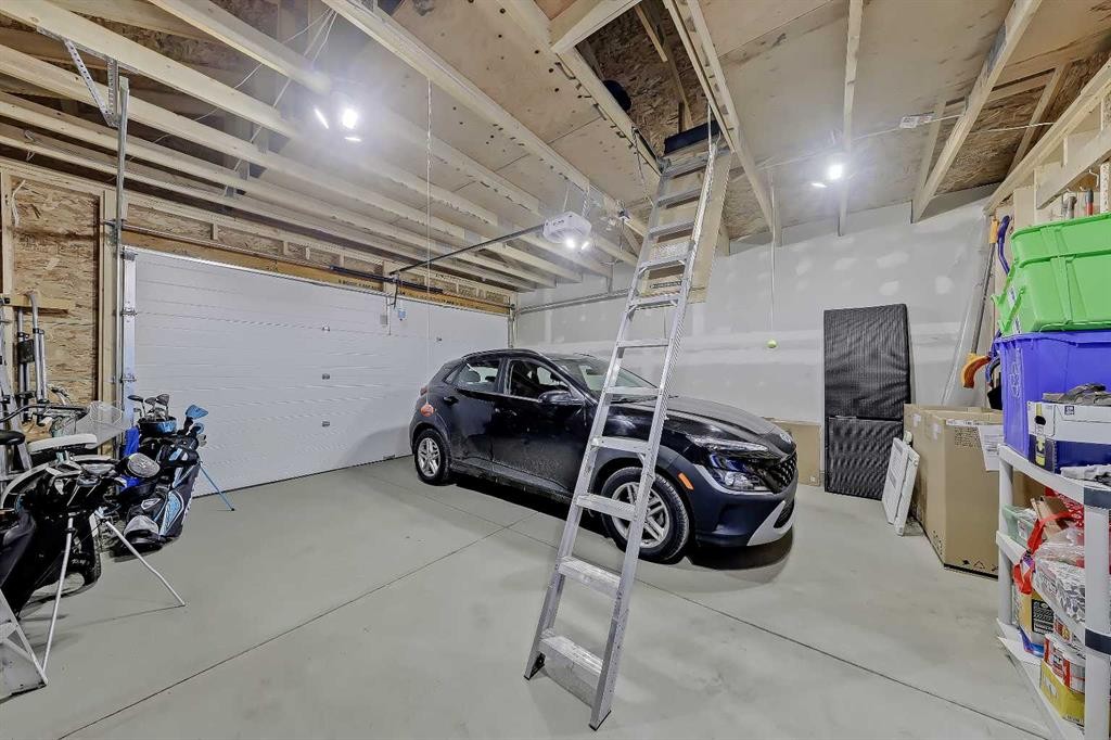 164 Setonstone Manor Se, Calgary, AB - Indoor Photo Showing Garage