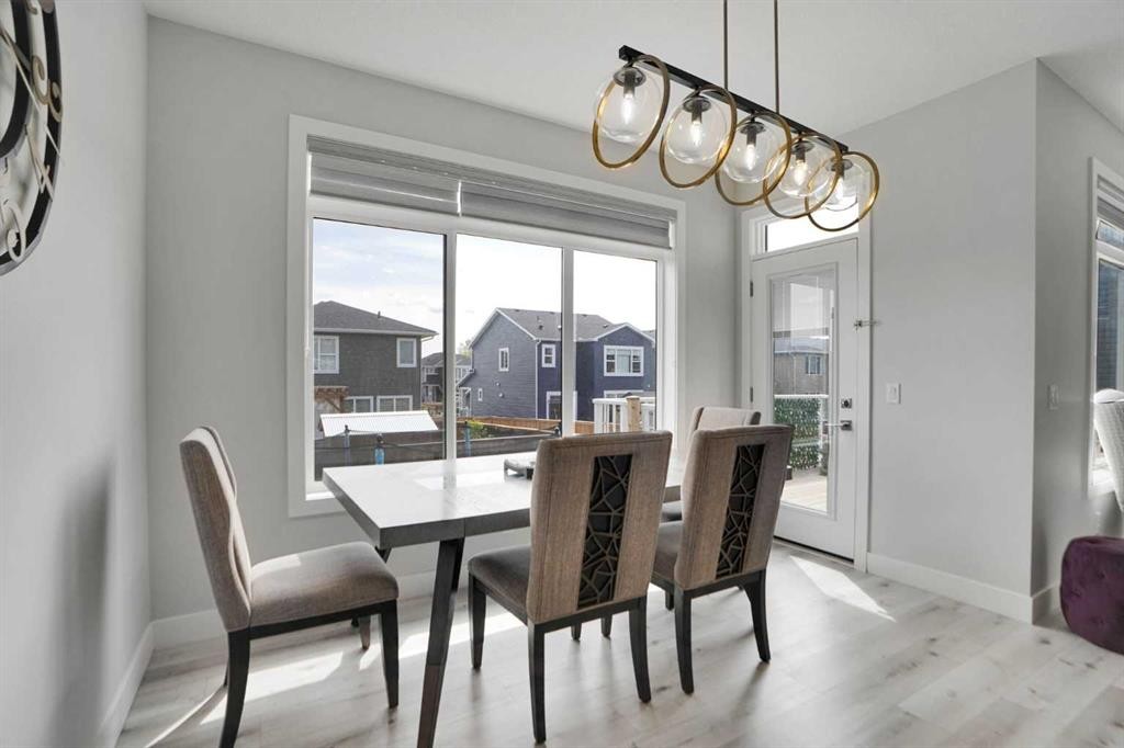 3 Rivercrest Common, Cochrane, AB - Indoor Photo Showing Dining Room