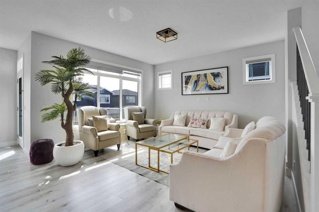 3 Rivercrest Common, Cochrane, AB - Indoor Photo Showing Living Room
