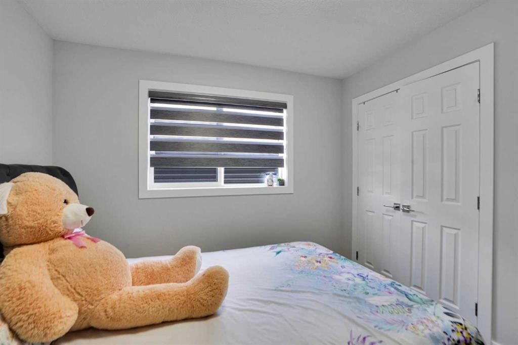 3 Rivercrest Common, Cochrane, AB - Indoor Photo Showing Bedroom