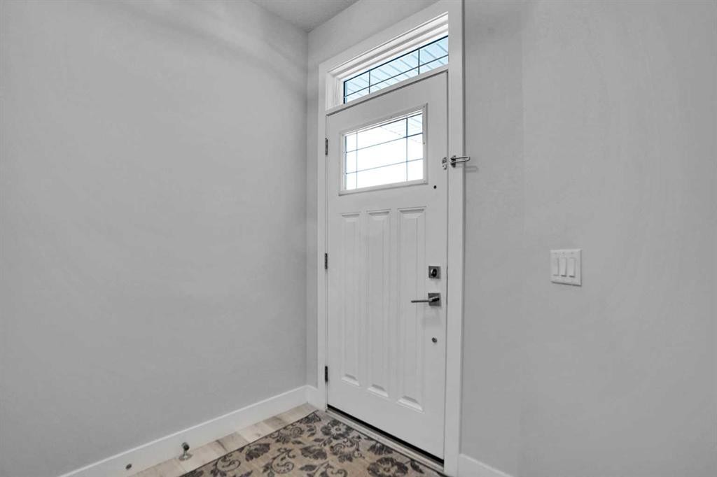 3 Rivercrest Common, Cochrane, AB - Indoor Photo Showing Other Room