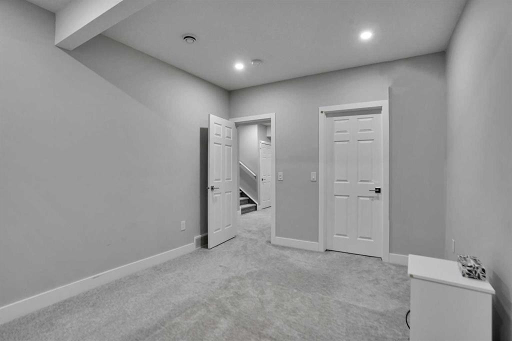 3 Rivercrest Common, Cochrane, AB - Indoor Photo Showing Other Room