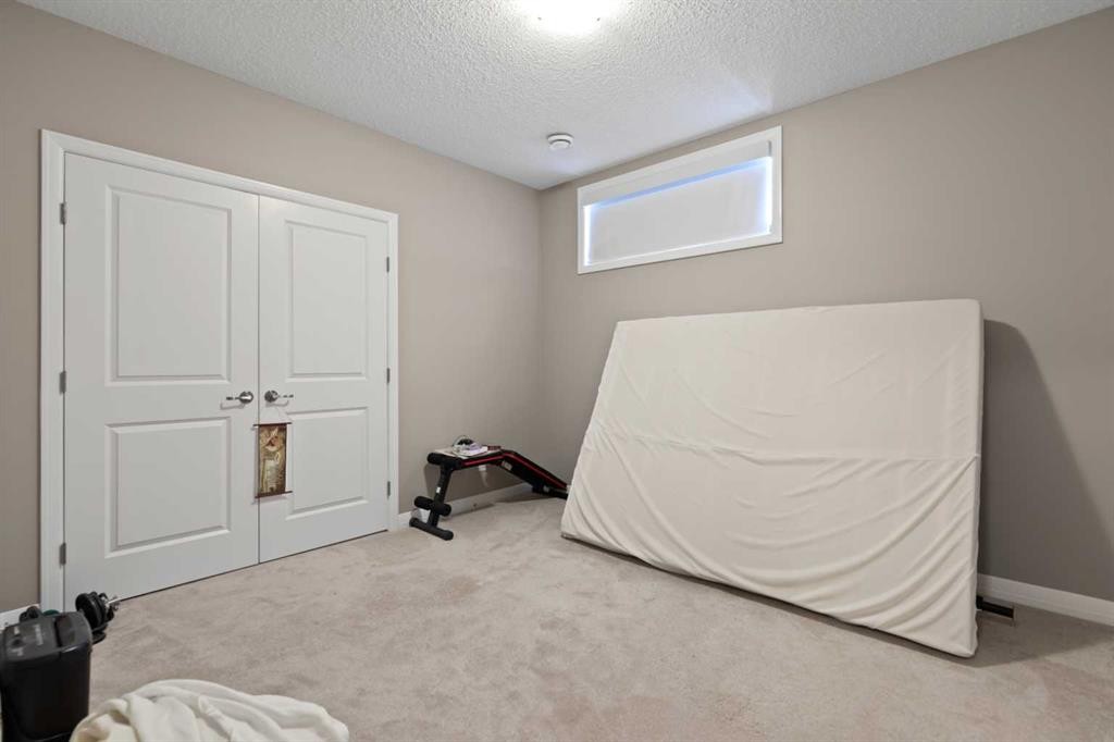 79 Cornerstone Passage Ne, Calgary, AB - Indoor Photo Showing Bedroom