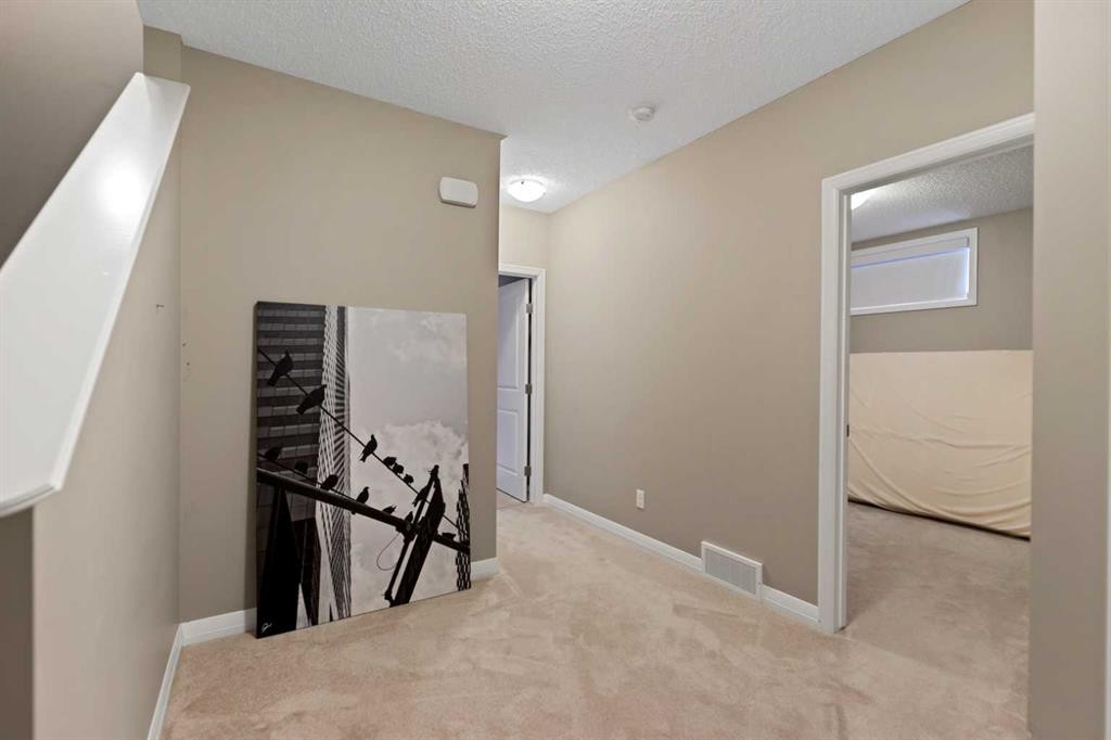 79 Cornerstone Passage Ne, Calgary, AB - Indoor Photo Showing Other Room