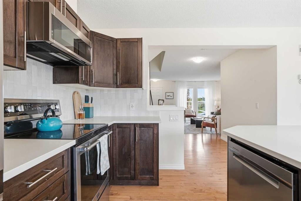 24 Auburn Crest Park Se, Calgary, AB - Indoor Photo Showing Kitchen With Stainless Steel Kitchen
