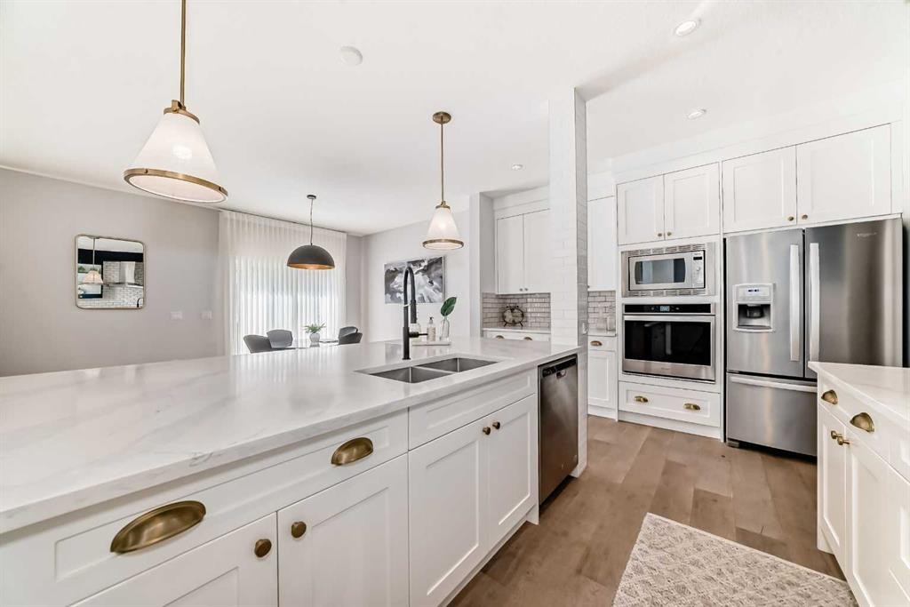 420 Legacy View Se, Calgary, AB - Indoor Photo Showing Kitchen With Stainless Steel Kitchen With Double Sink With Upgraded Kitchen