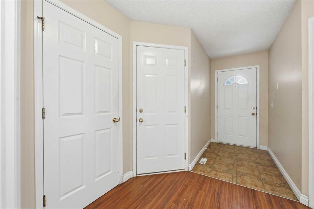 25 Tararidge Circle Ne, Calgary, AB - Indoor Photo Showing Other Room