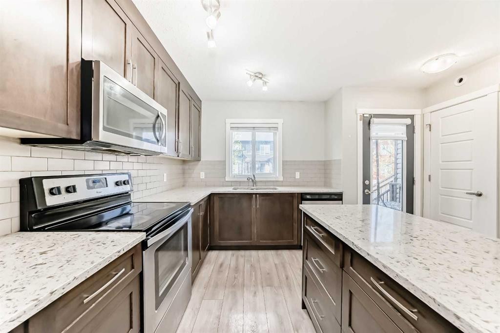 228 Red Embers Way Ne, Calgary, AB - Indoor Photo Showing Kitchen With Upgraded Kitchen