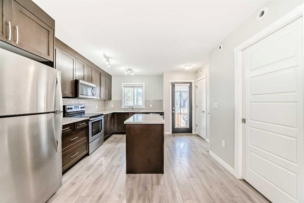 228 Red Embers Way Ne, Calgary, AB - Indoor Photo Showing Kitchen With Stainless Steel Kitchen With Upgraded Kitchen